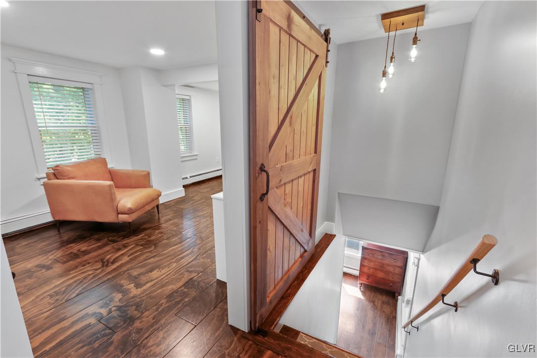 389 West Nesquehoning Street Easton, PA 18042 - Photo 31 of 44 a living room with furniture and stairs