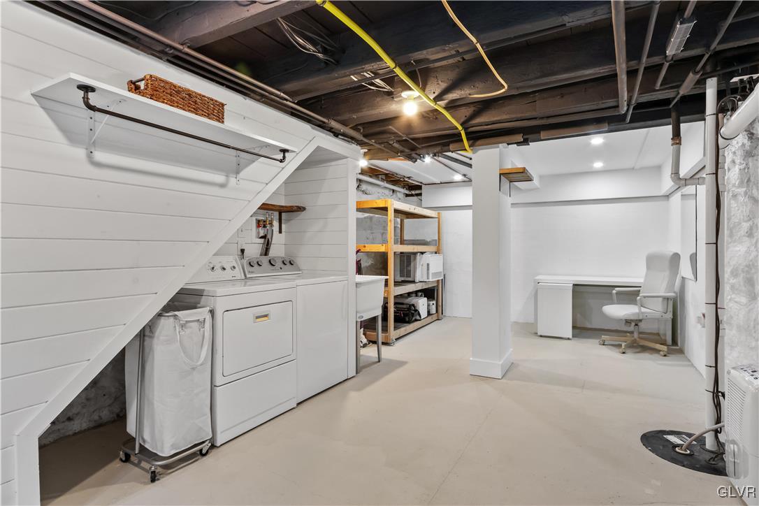 389 West Nesquehoning Street Easton, PA 18042 - Photo 35 of 44 a utility room with multiple dryer and washer