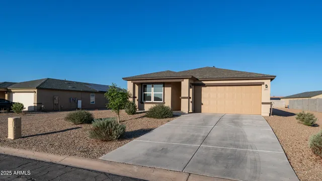 a view of a house with a patio