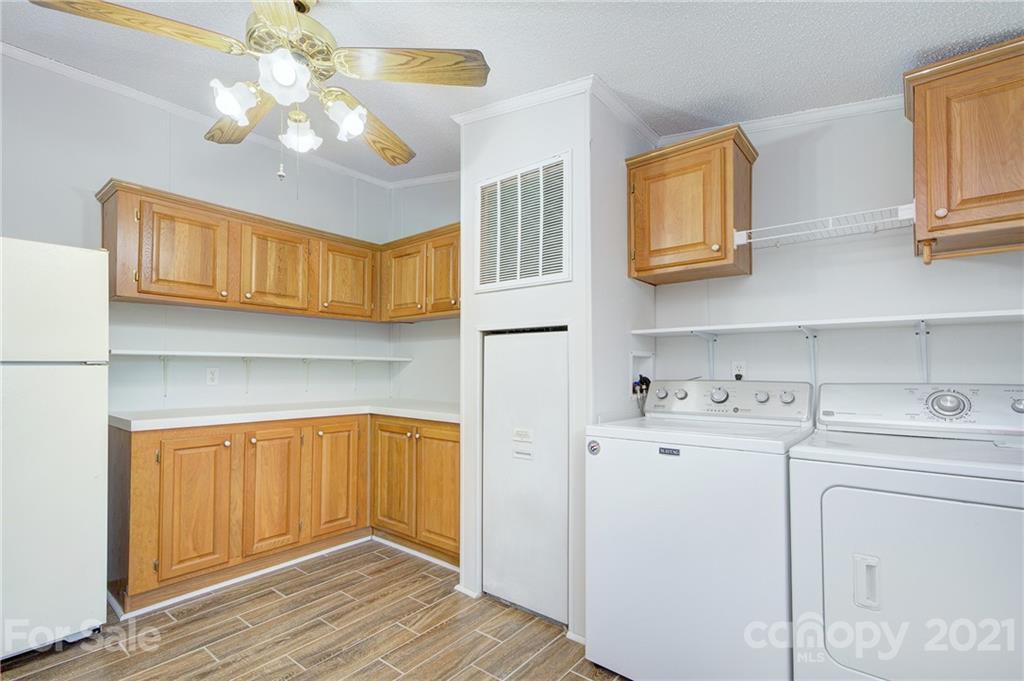 7918 Morgan Mill Road Monroe, NC 28110 - Photo 15 of 37 a view of cabinets and window