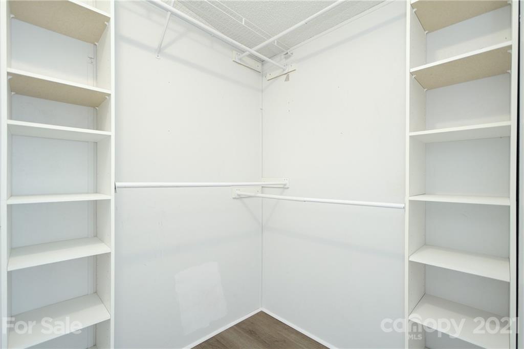 7918 Morgan Mill Road Monroe, NC 28110 - Photo 17 of 37 a view of an empty walk in closet