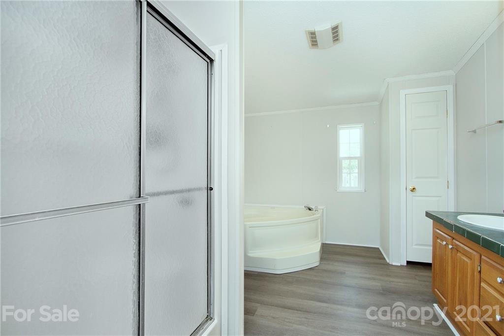 7918 Morgan Mill Road Monroe, NC 28110 - Photo 18 of 37 a view of an empty room