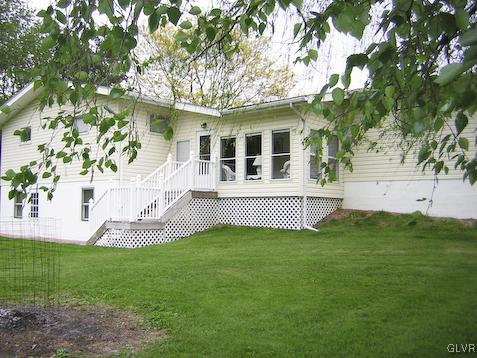 288 Hunter Forge Road Macungie, PA 18062 - Photo 17 of 18 a front view of a house with a yard