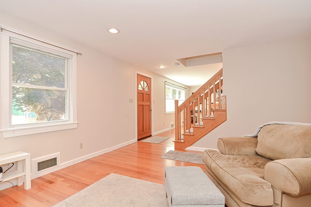 51 Albert Road Newton, MA 02466 - Photo 16 of 40 a living room with furniture and a window