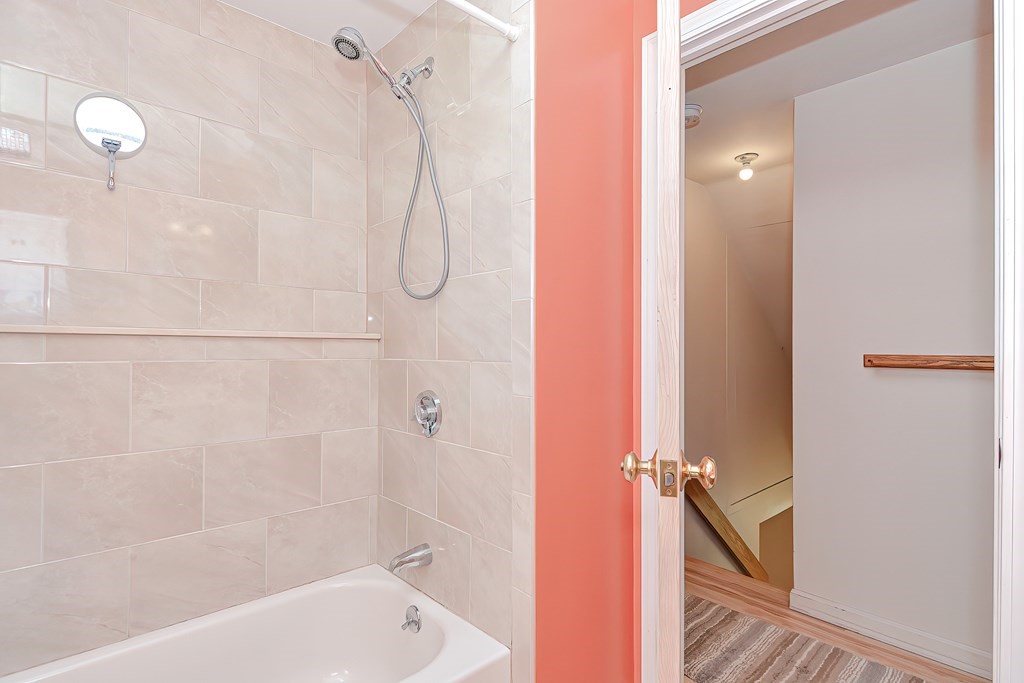 51 Albert Road Newton, MA 02466 - Photo 26 of 40 a bathroom with a bath tub and shower