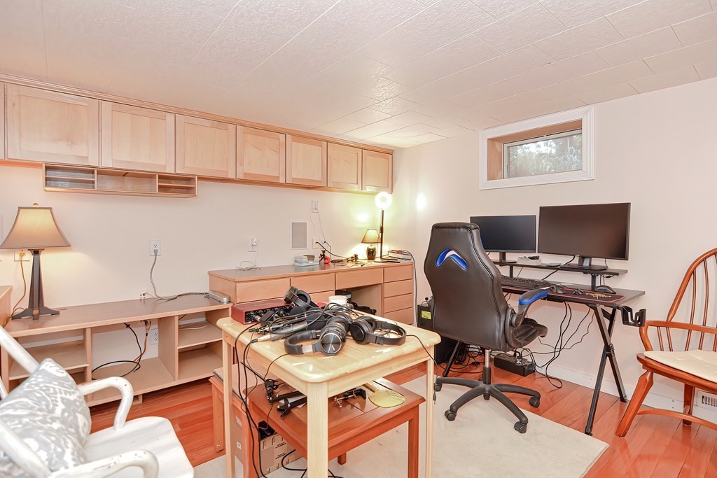 51 Albert Road Newton, MA 02466 - Photo 27 of 40 a work place with a desk chair and white appliances