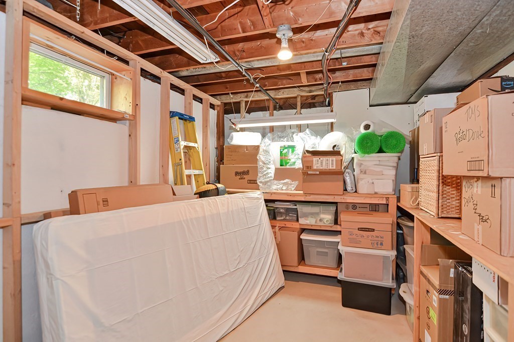 51 Albert Road Newton, MA 02466 - Photo 28 of 40 a bed room with a bed and a table