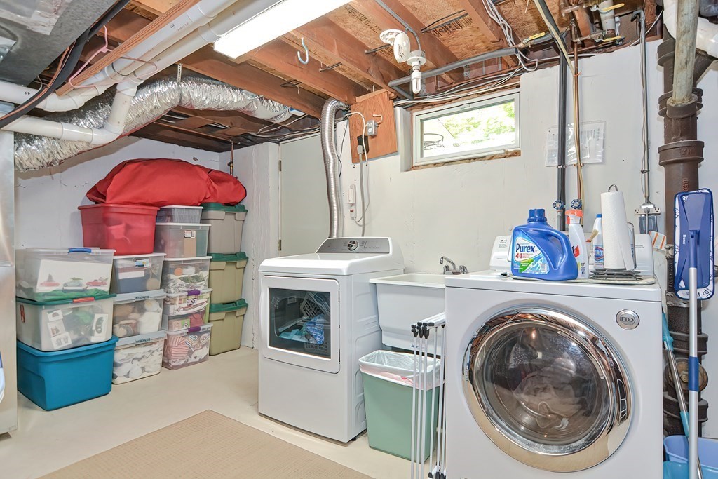 51 Albert Road Newton, MA 02466 - Photo 30 of 40 a utility room with dryer and washer
