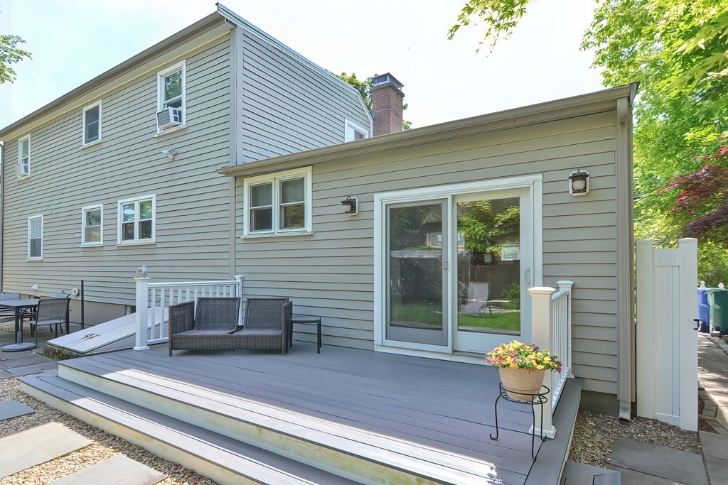 51 Albert Road Newton, MA 02466 - Photo 33 of 40 a front view of a house with outdoor seating