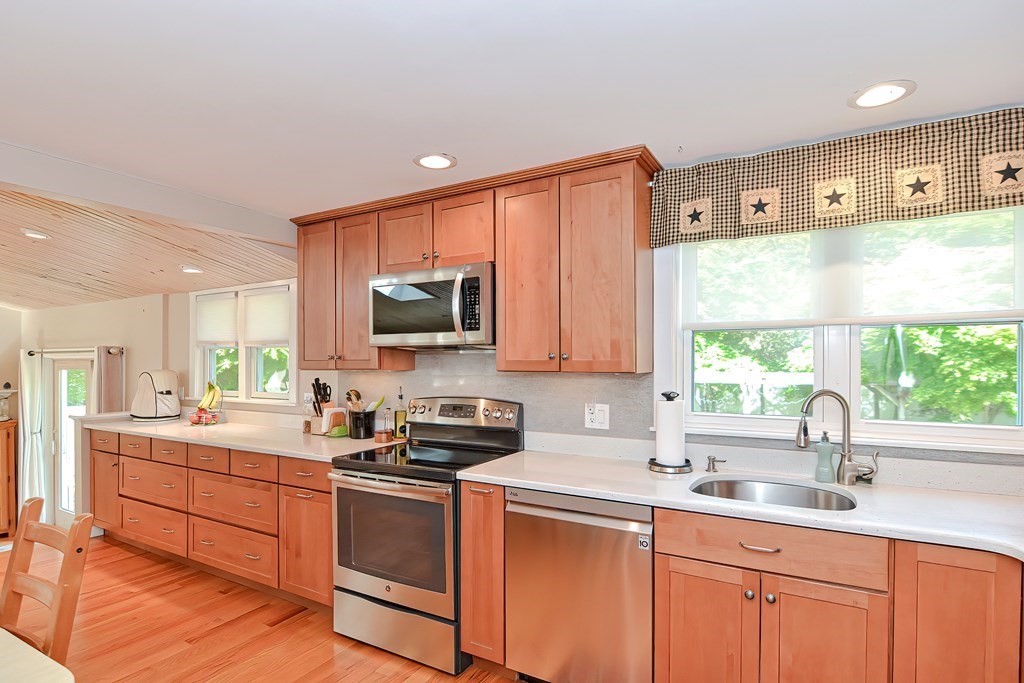 51 Albert Road Newton, MA 02466 - Photo 9 of 40 a kitchen with a sink cabinets and window