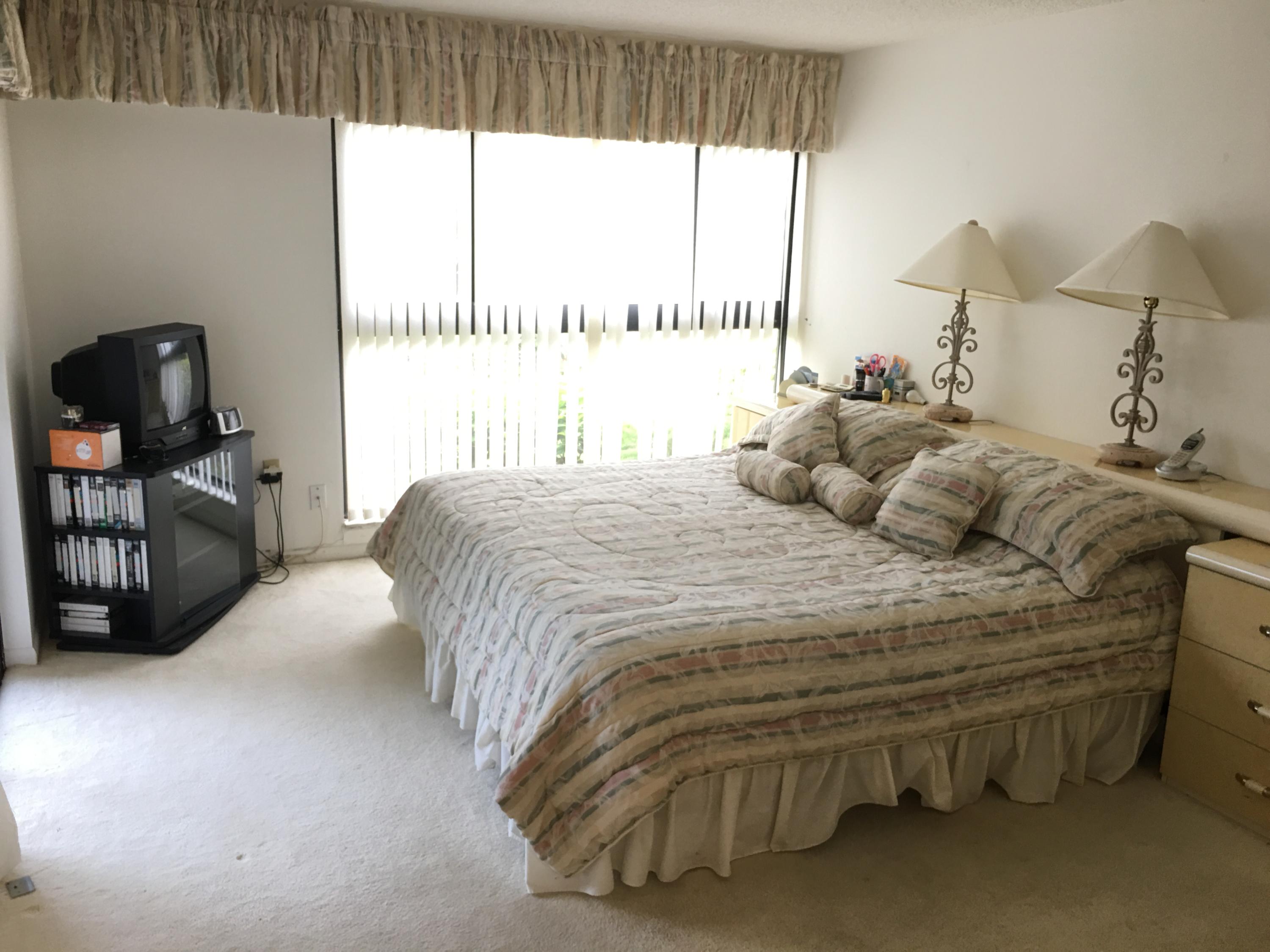 7783 Lakeside Boulevard, Unit G703 Boca Raton, FL 33434 - Photo 16 of 33 Master bedroom