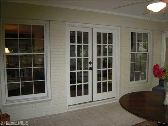 1702 Hobbs Road Greensboro, NC 27410 - Photo 14 of 16 Enclosed Porch.