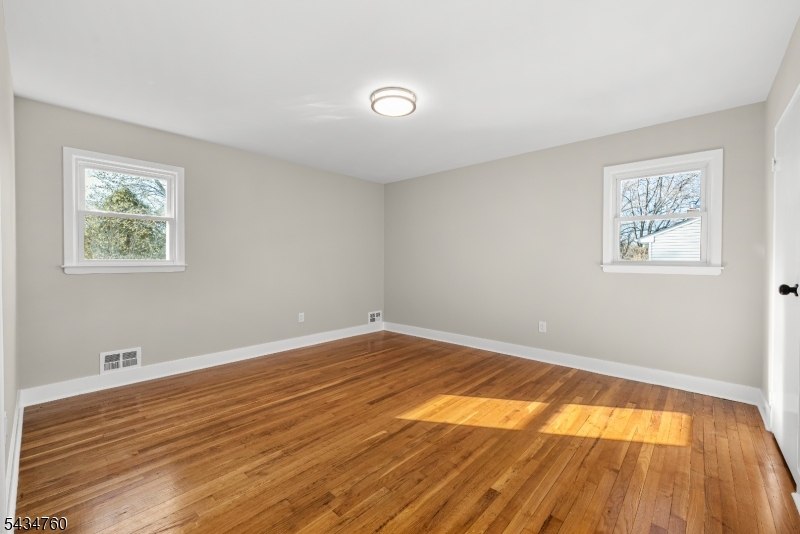 641 Ydv-ham Sq Road Robbinsville, NJ 08691 - Photo 16 of 49 a view of an empty room and wooden floor