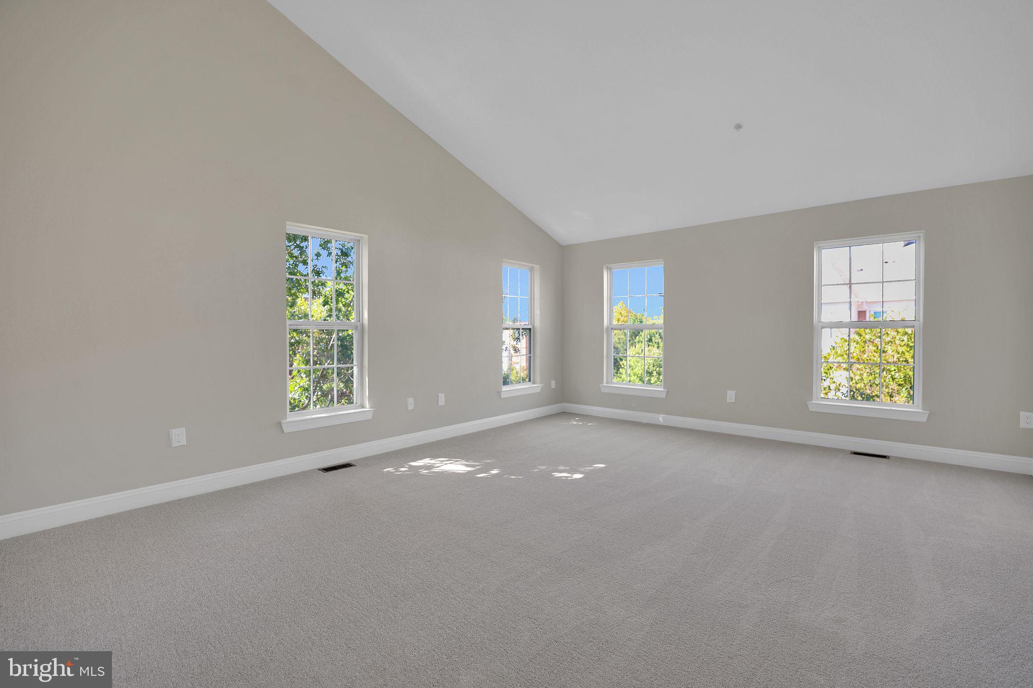 111 A Chevy Chase Street, Unit 111A Gaithersburg, MD 20878 - Photo 17 of 47 an empty room with windows
