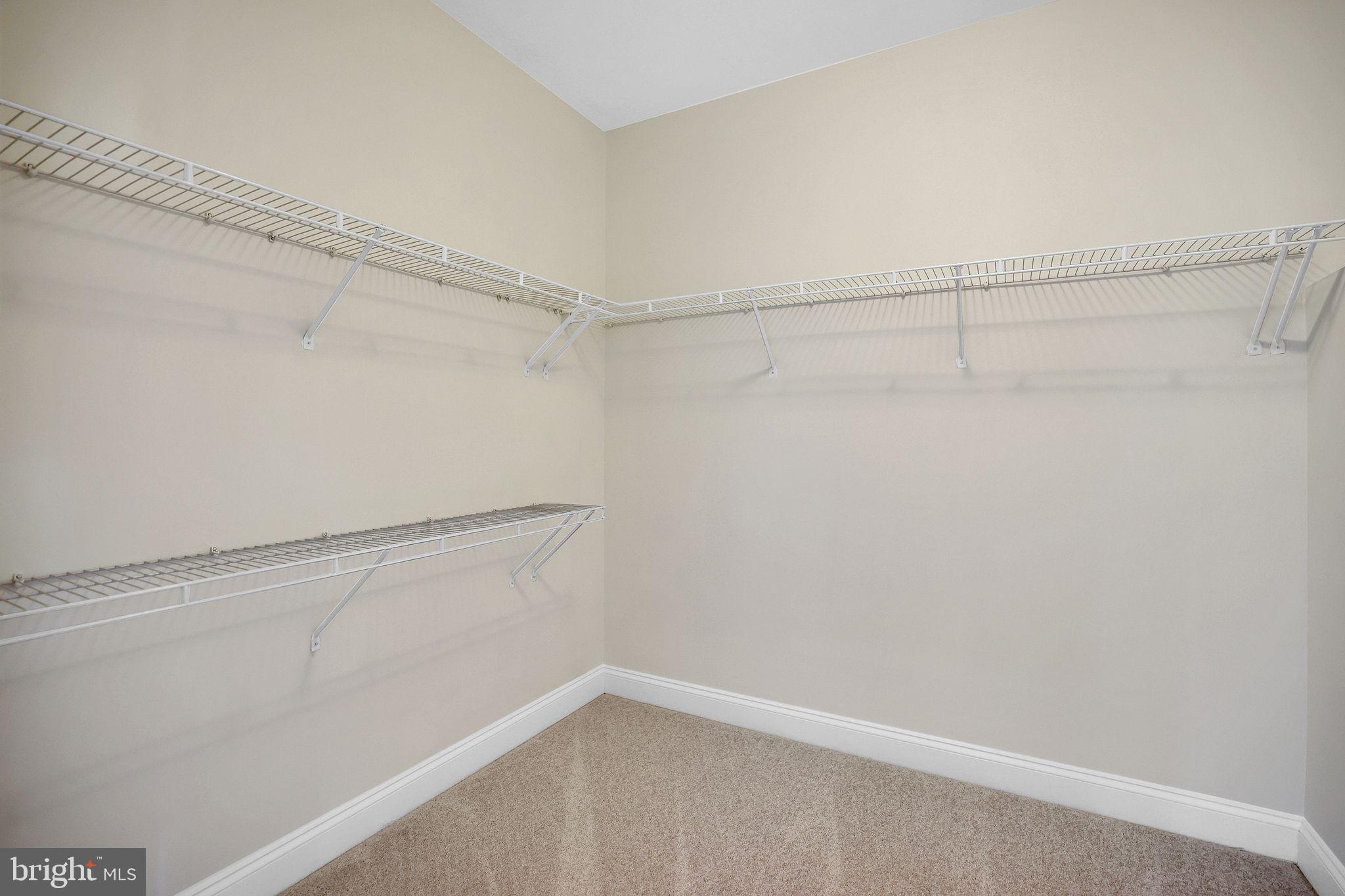 111 A Chevy Chase Street, Unit 111A Gaithersburg, MD 20878 - Photo 21 of 47 a view of a room with racks on the wall