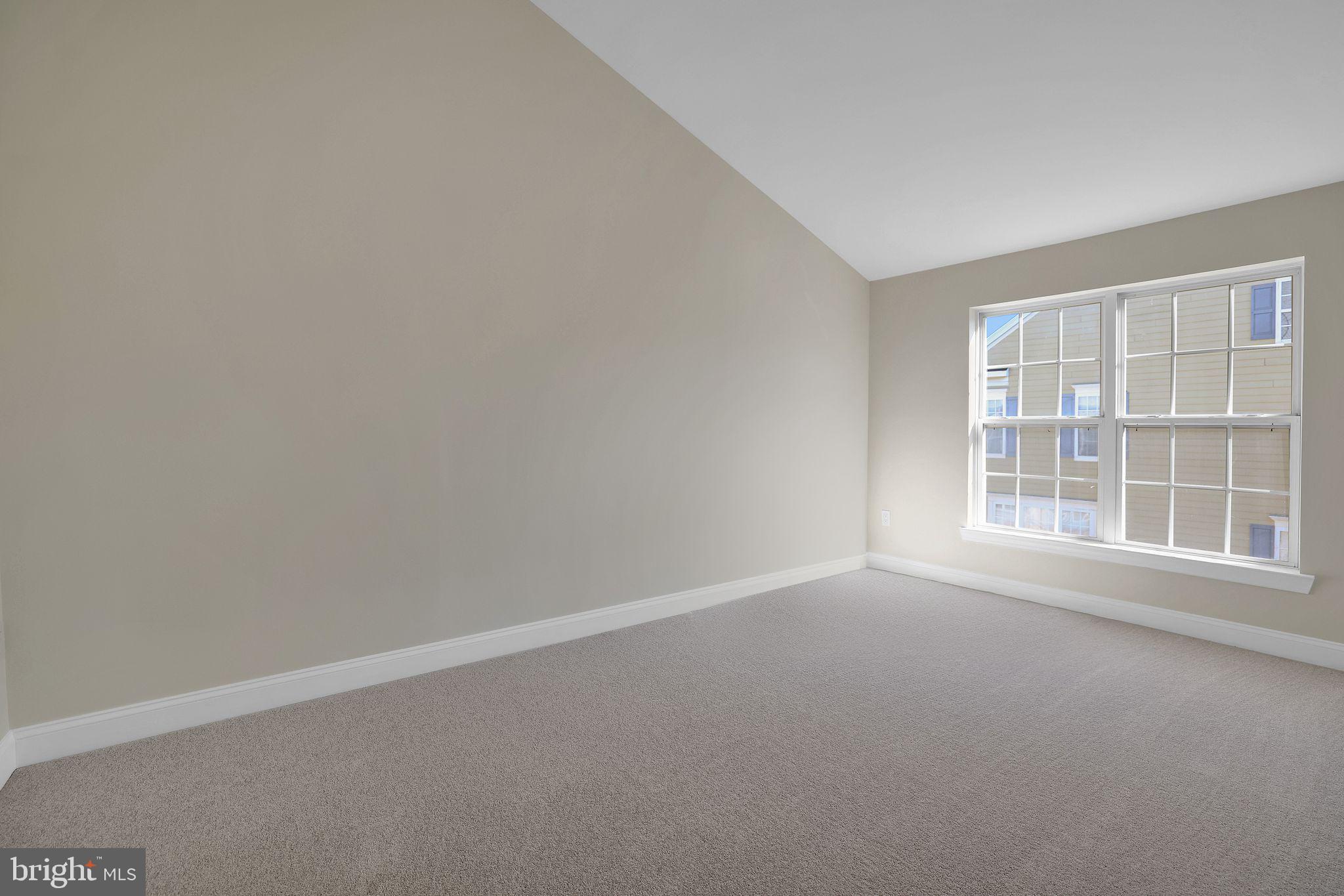 111 A Chevy Chase Street, Unit 111A Gaithersburg, MD 20878 - Photo 26 of 47 an empty room with a window