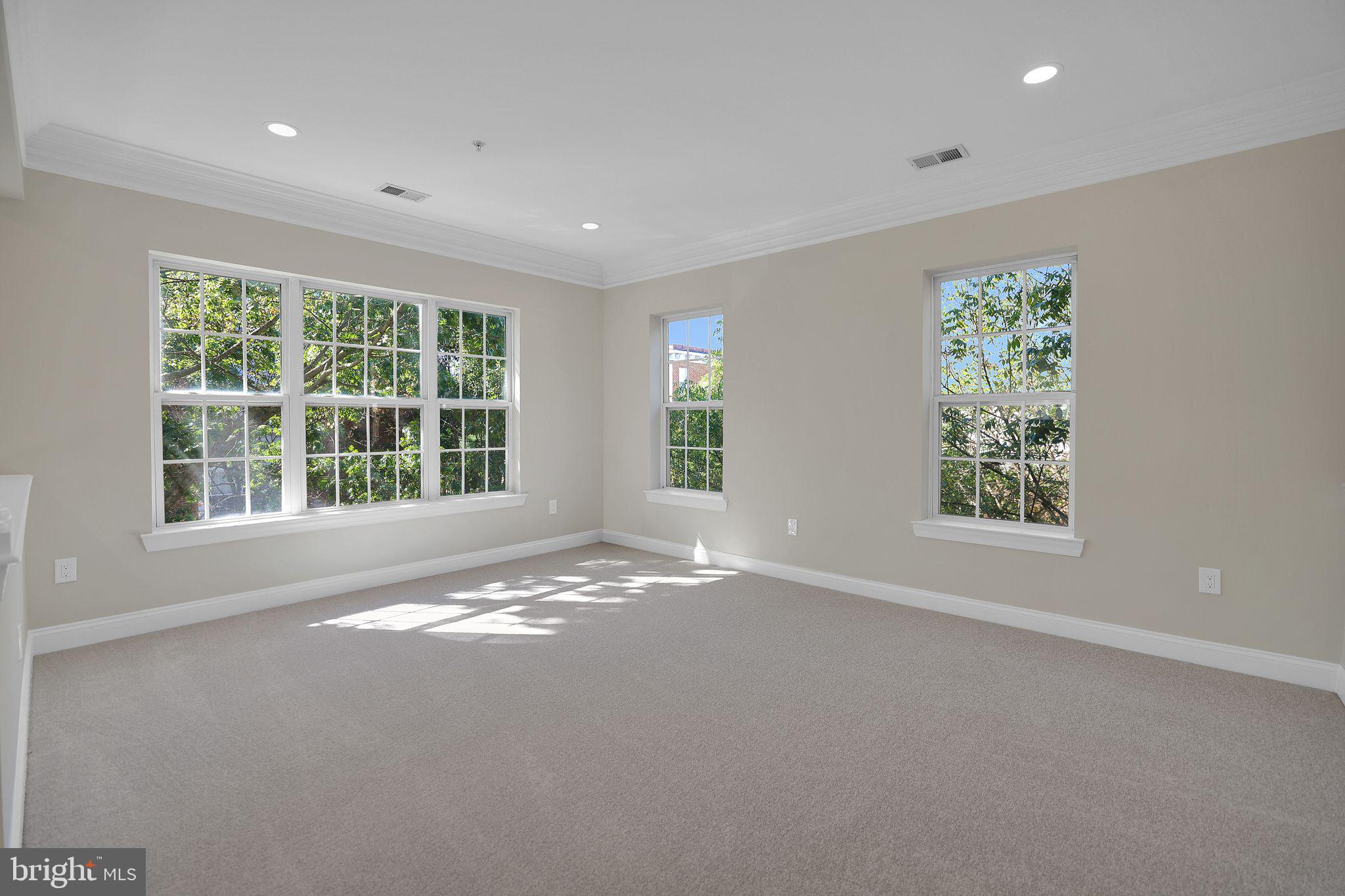 111 A Chevy Chase Street, Unit 111A Gaithersburg, MD 20878 - Photo 3 of 47 a view of an empty room with a window