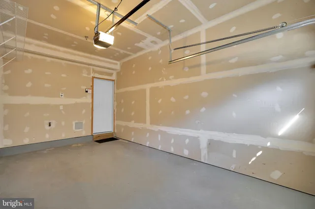 a view of a room with an empty space