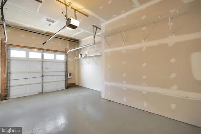a view of storage and utility room with stairs