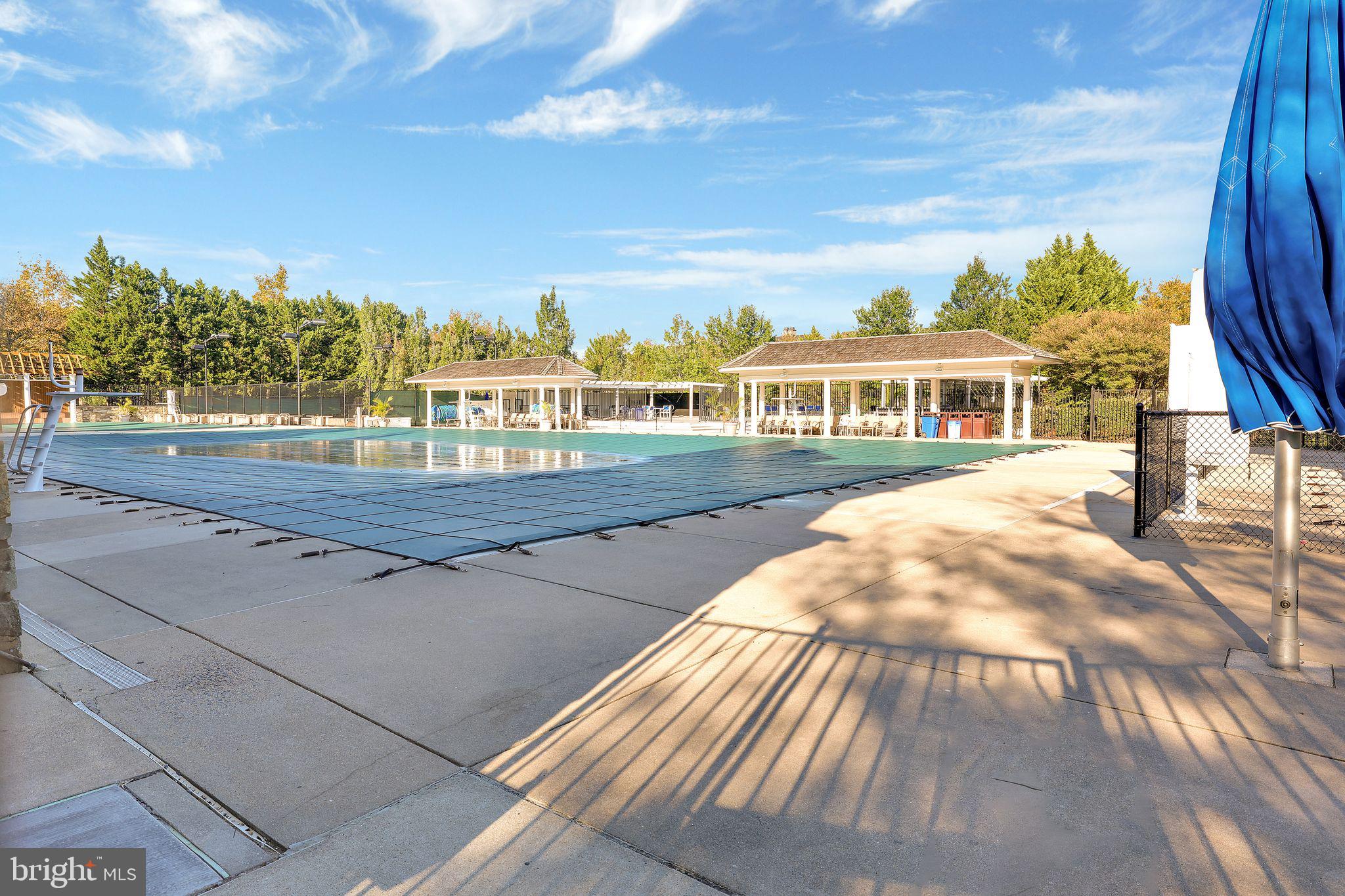 111 A Chevy Chase Street, Unit 111A Gaithersburg, MD 20878 - Photo 38 of 47 a view of swimming pool with outdoor seating