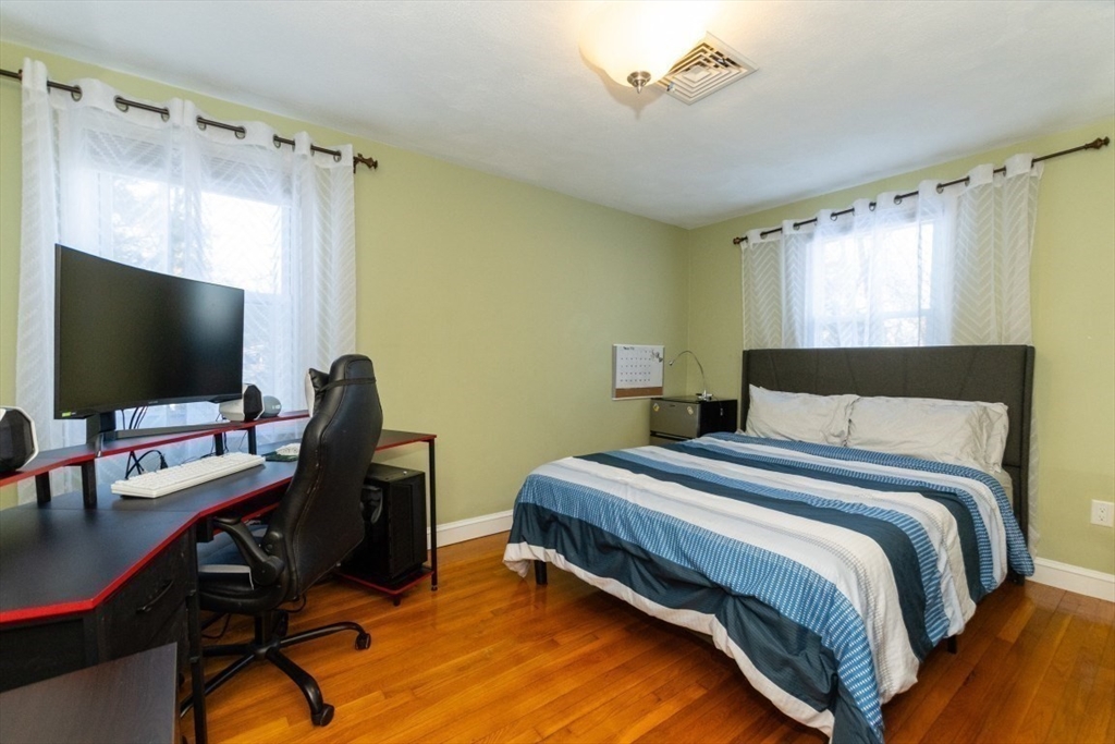 9 Bruce Street Burlington, MA 01803 - Photo 16 of 38 a bedroom with a workspace
