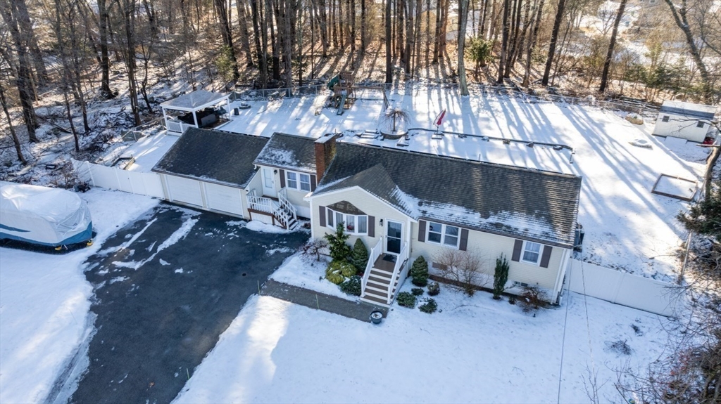 9 Bruce Street Burlington, MA 01803 - Photo 30 of 38 an aerial view of a house with a yard