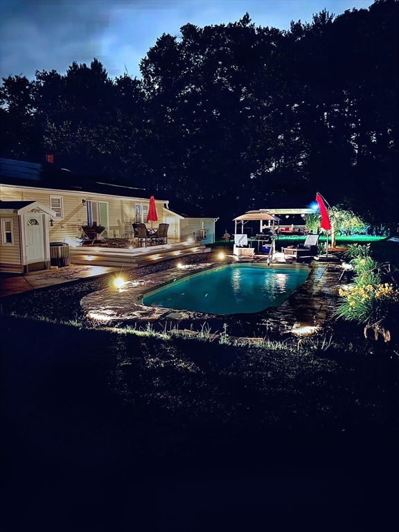 9 Bruce Street Burlington, MA 01803 - Photo 34 of 38 a view of swimming pool outdoor seating and city