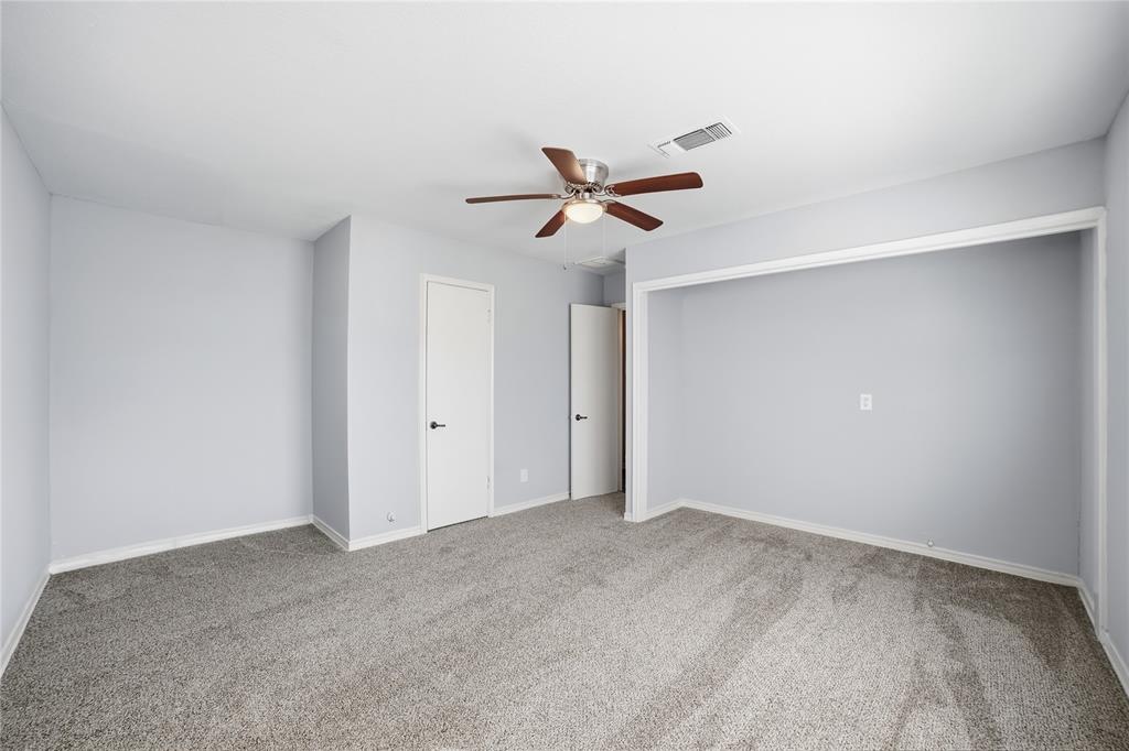 2926 North Prairie Creek Road Dallas, TX 75227 - Photo 16 of 22 a view of a ceiling fan in a room