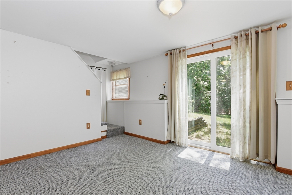 8 Emerald Way Sandwich, MA 02644 - Photo 23 of 36 an empty room with windows