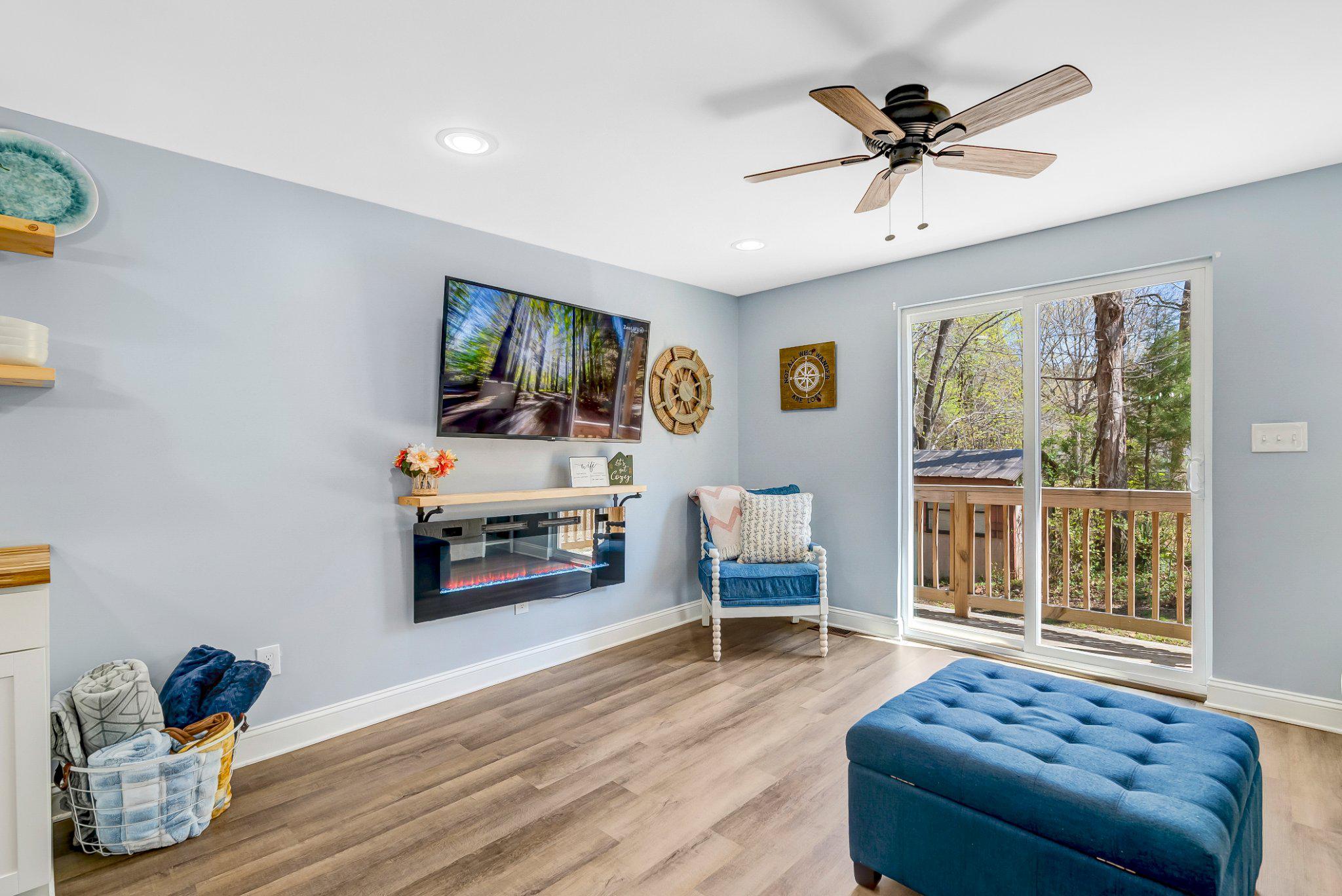 782 Mt Ararat Road Clarksville, VA 23927 - Photo 15 of 28 a living room with furniture and a flat screen tv