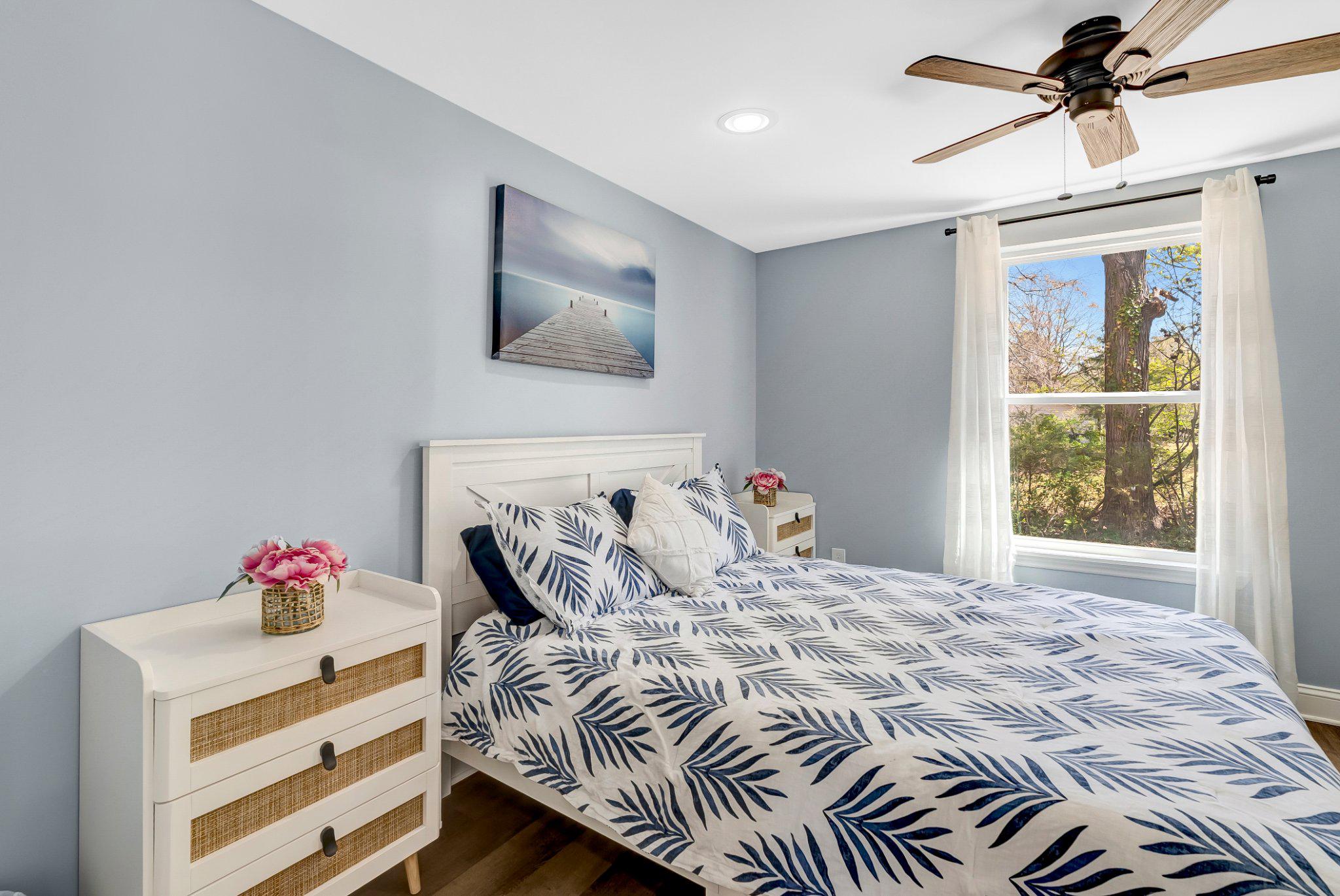 782 Mt Ararat Road Clarksville, VA 23927 - Photo 19 of 28 a bedroom with a bed and a dresser