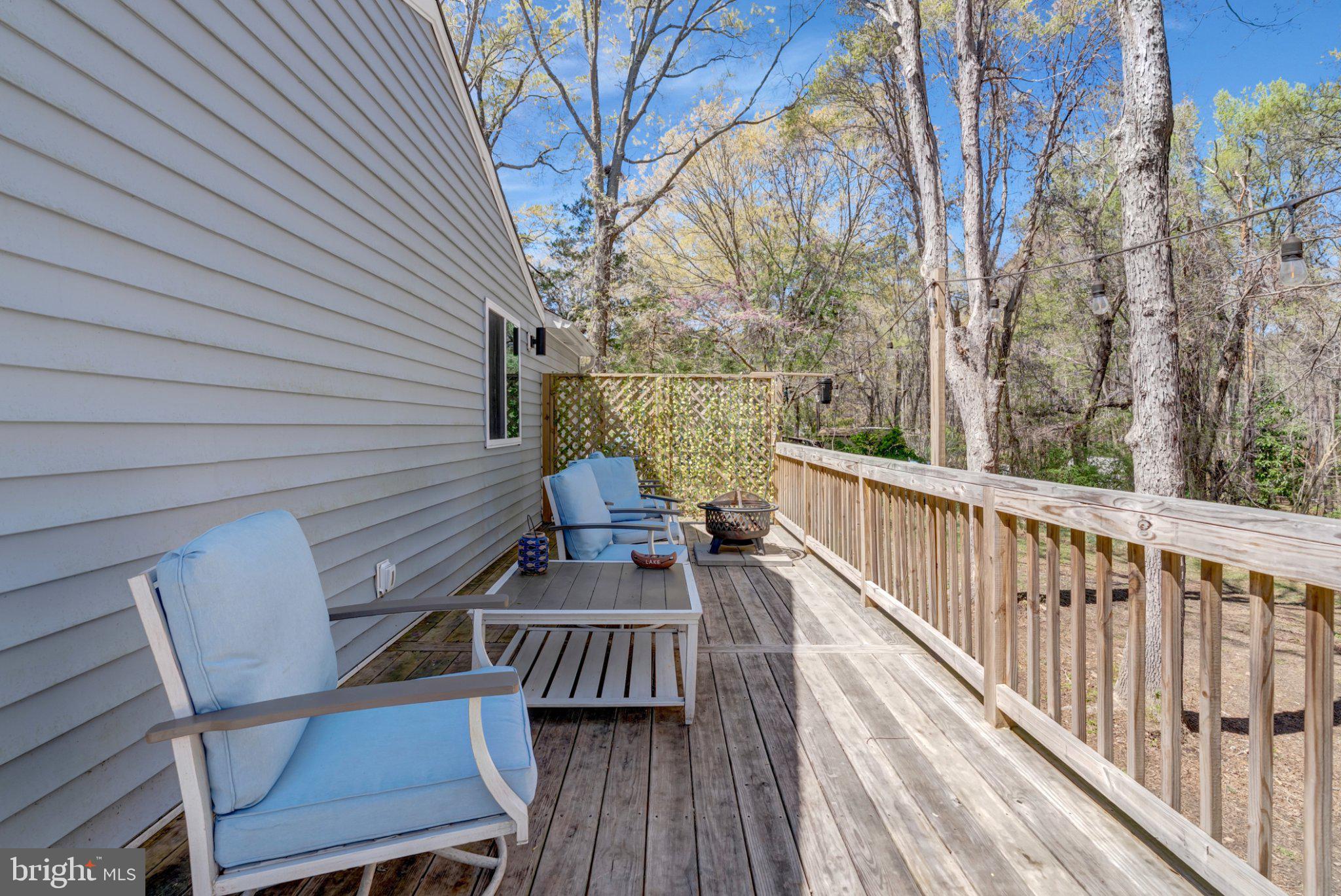 782 Mt Ararat Road Clarksville, VA 23927 - Photo 26 of 28 a view of balcony with wooden floor and outdoor seating