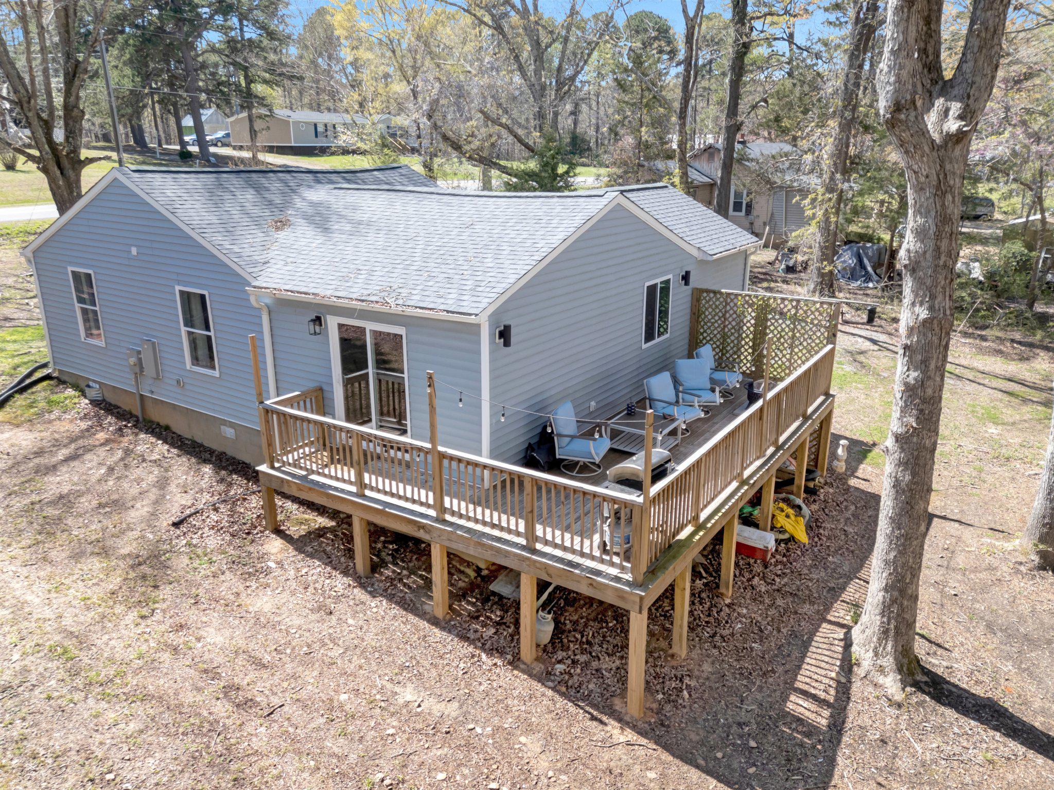 782 Mt Ararat Road Clarksville, VA 23927 - Photo 4 of 28 a roof covered with tall trees