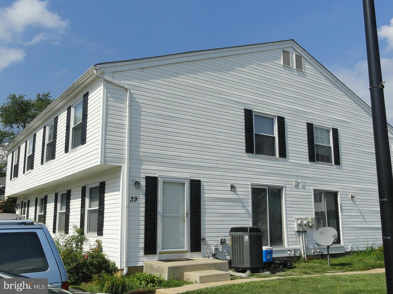 39 Coliston Road, Unit B Reisterstown, MD 21136 - Photo 1 of 20 a view of a house with a yard