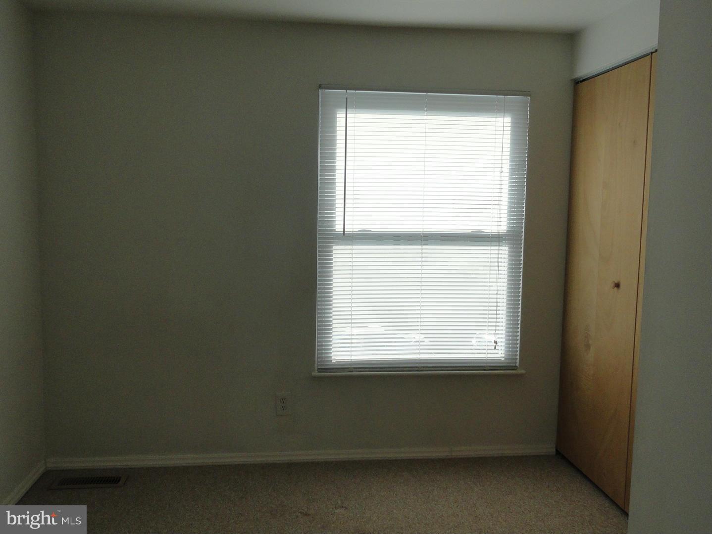 39 Coliston Road, Unit B Reisterstown, MD 21136 - Photo 13 of 20 a view of an empty room with a window