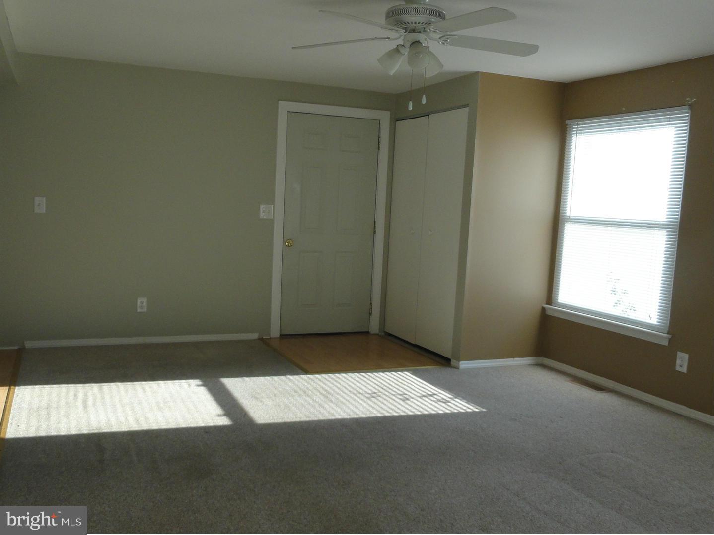 39 Coliston Road, Unit B Reisterstown, MD 21136 - Photo 3 of 20 an empty room with a empty space and a window