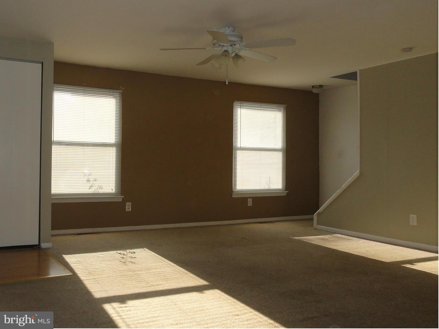 39 Coliston Road, Unit B Reisterstown, MD 21136 - Photo 5 of 20 an empty room with windows