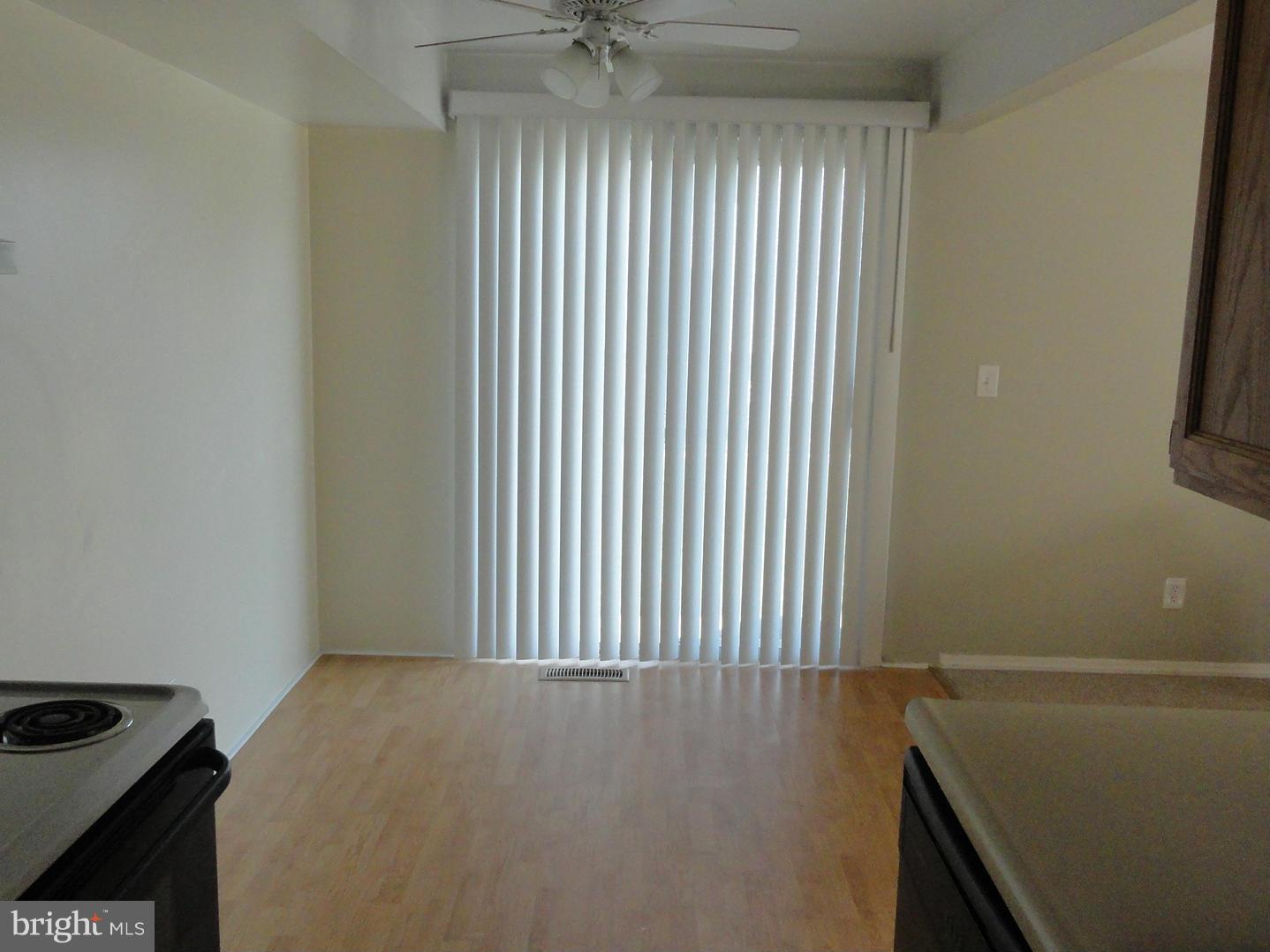 39 Coliston Road, Unit B Reisterstown, MD 21136 - Photo 8 of 20 a view of a livingroom with a fan