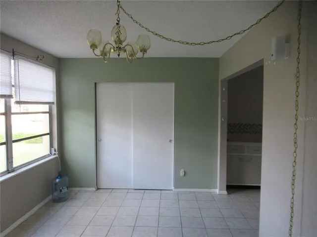 a bathroom with a shower and a toilet