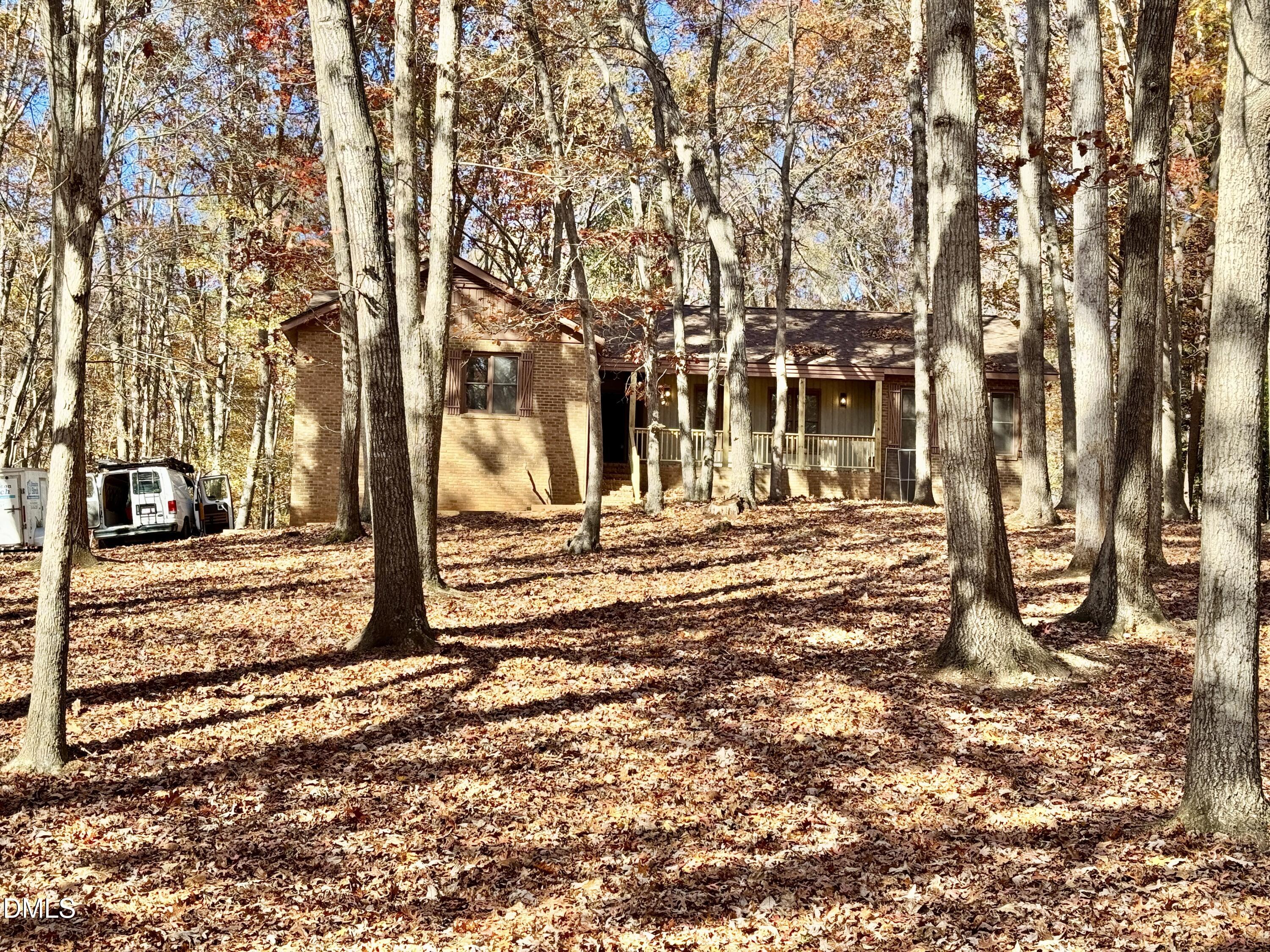 3412 Hackney Court Raleigh, NC 27613 - Photo 2 of 27 a view of a yard with trees