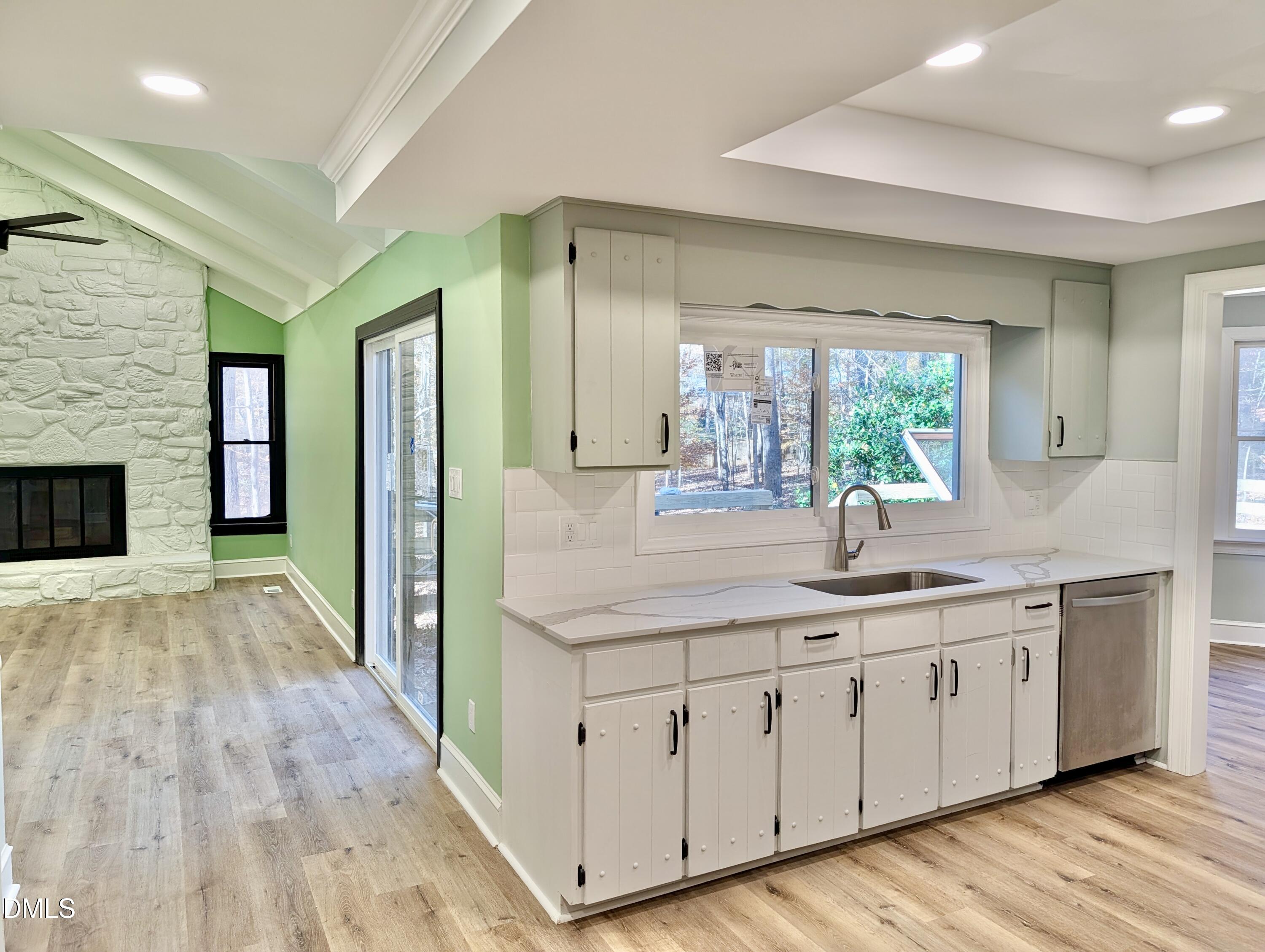 3412 Hackney Court Raleigh, NC 27613 - Photo 3 of 27 a spacious bathroom with a double vanity sink and a large mirror