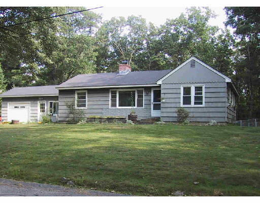 40 Banner Road Gardner, MA 01440 - Photo 1 of 1 a front view of a house with a garden