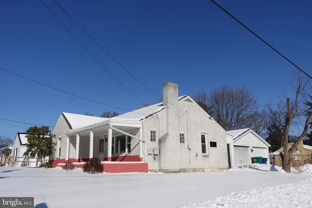 a view of large white house
