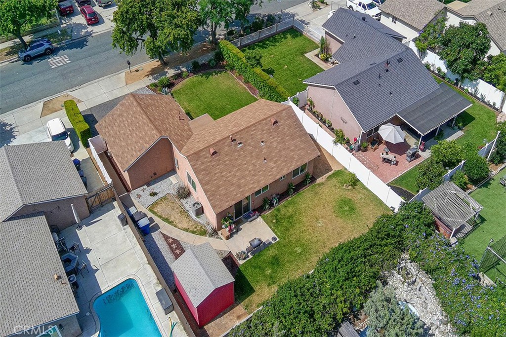 9595 Altadena Drive Riverside, CA 92503 - Photo 28 of 31 Aerial view of the property overlooking the backyard with shed.