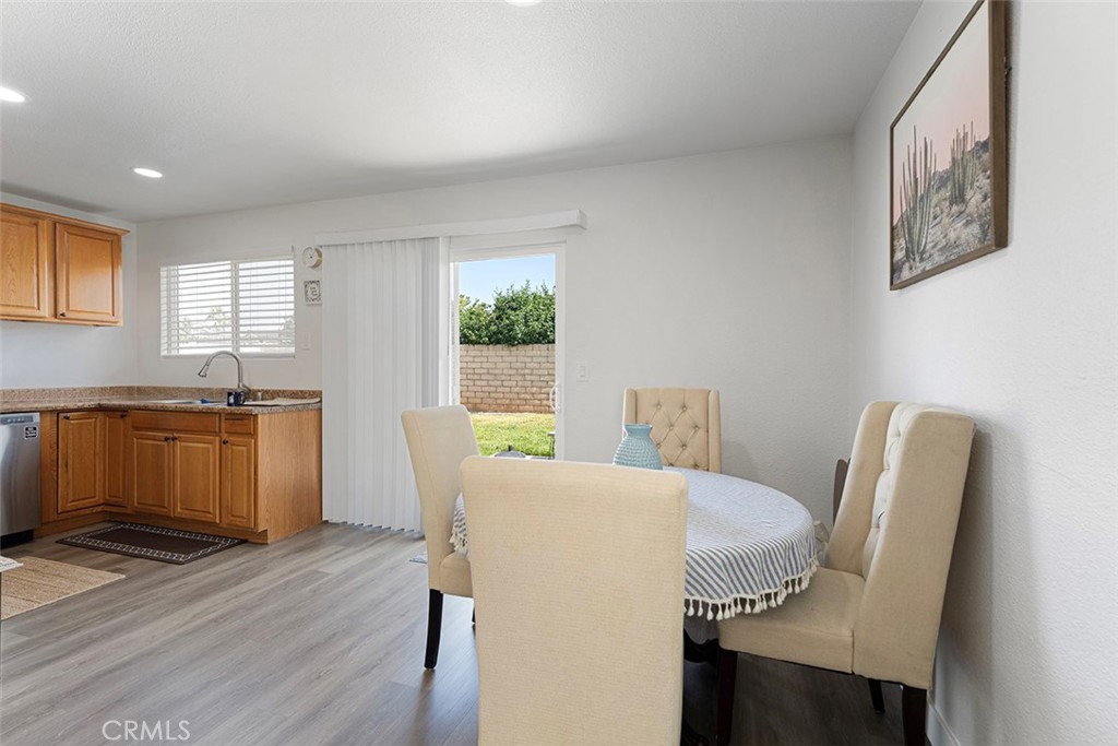 9595 Altadena Drive Riverside, CA 92503 - Photo 6 of 31 Dining area with sliders to the backyard.