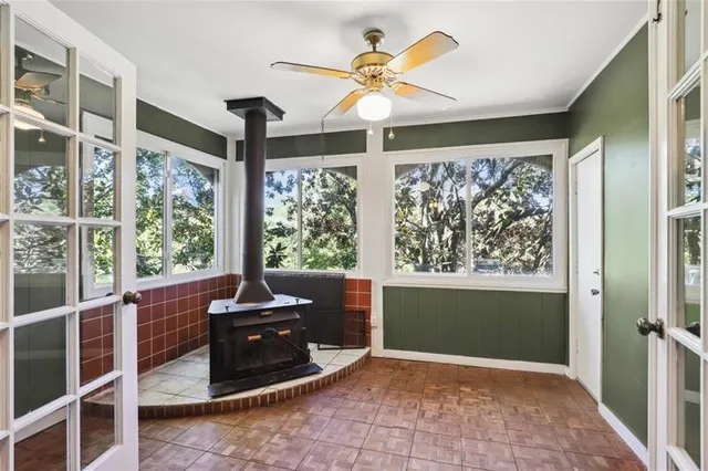 a view of a room with a large window