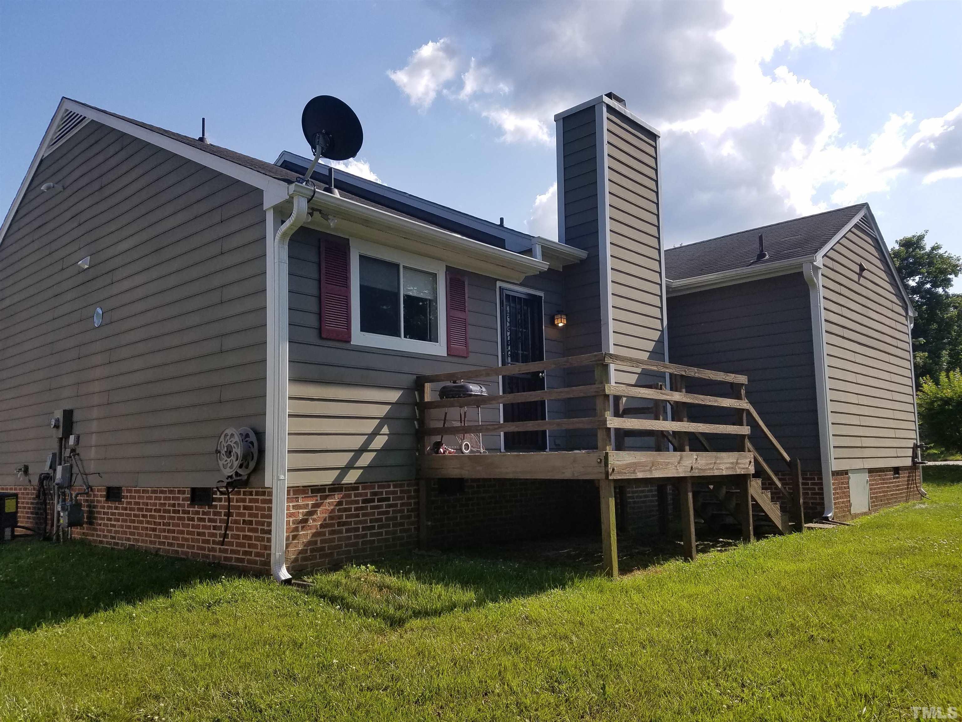 1815 Collier Road Durham, NC 27707 - Photo 14 of 14 a front view of a house with a yard