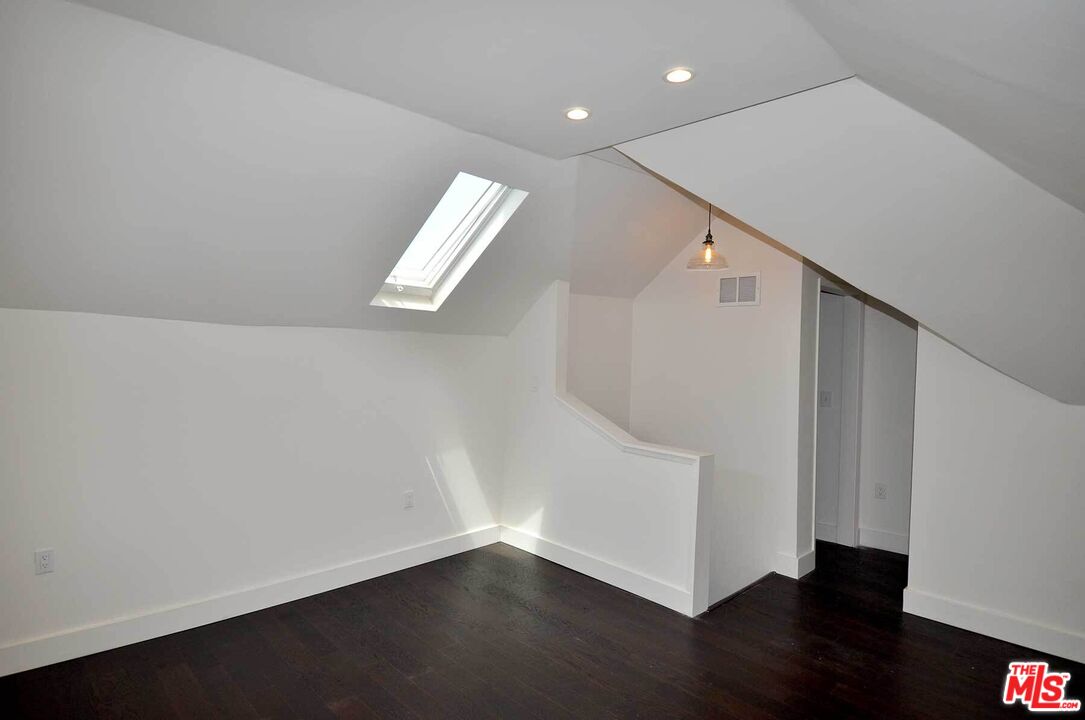 2315 2nd Street, Unit A Santa Monica, CA 90405 - Photo 16 of 17 a view of an empty room with wooden floor