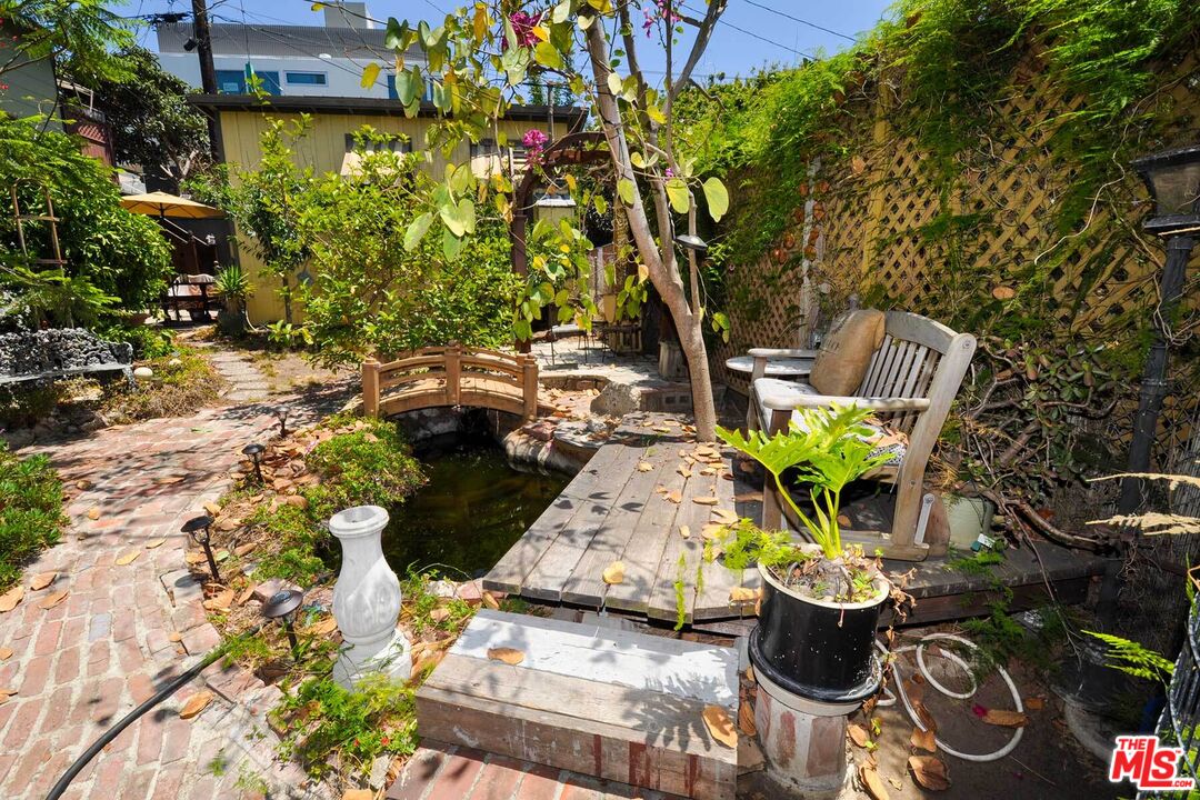 2315 2nd Street, Unit A Santa Monica, CA 90405 - Photo 17 of 17 a view of a backyard with sitting area and garden