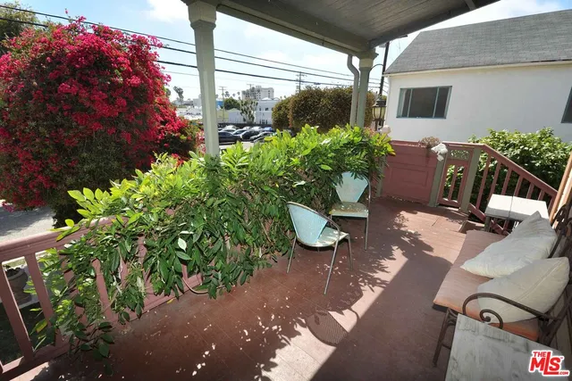 a view of a backyard with chair the garden